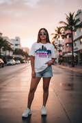 Hispanic girl wearing Miami Dreams tee on Ocean Drive