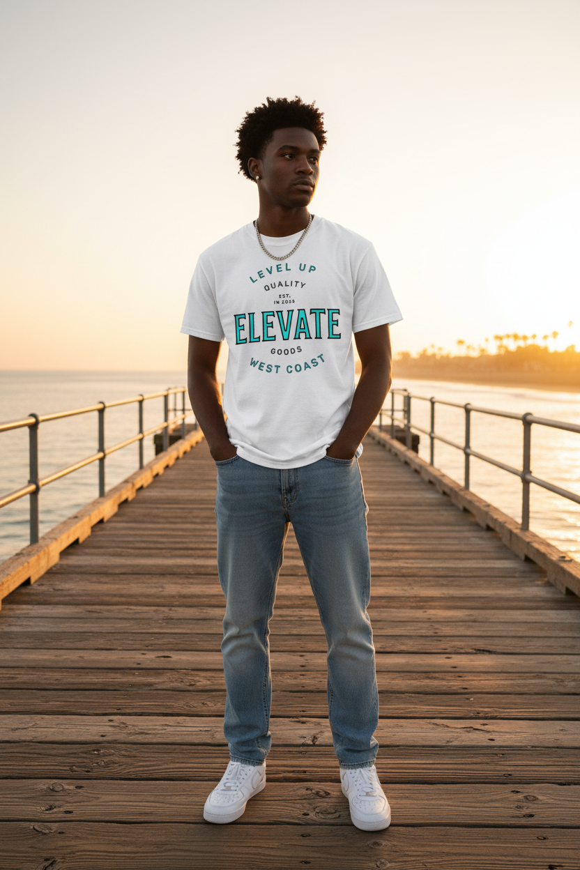 African American man wearing Elevate tee at pier sunset